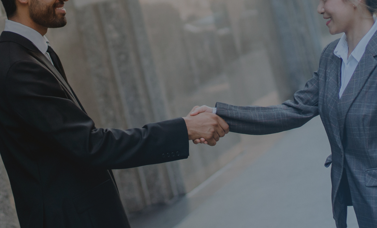 PetZONE360 Partnership Background - Business People Doing Handshake
